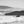 Into the Abyss Panorama: Surfer Paddling into Newport's Grand Waves Tracy McCrackin Photography Wall art - Tracy McCrackin Photography