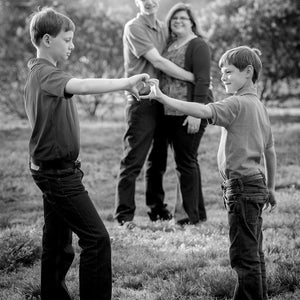 brotherly-love-with-heart-hands Giclee / B&W / 5 x 7 Tracy McCrackin Photography - Tracy McCrackin Photography